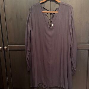 Long Sleeve V-Neck Dress with Lace-Up Back.